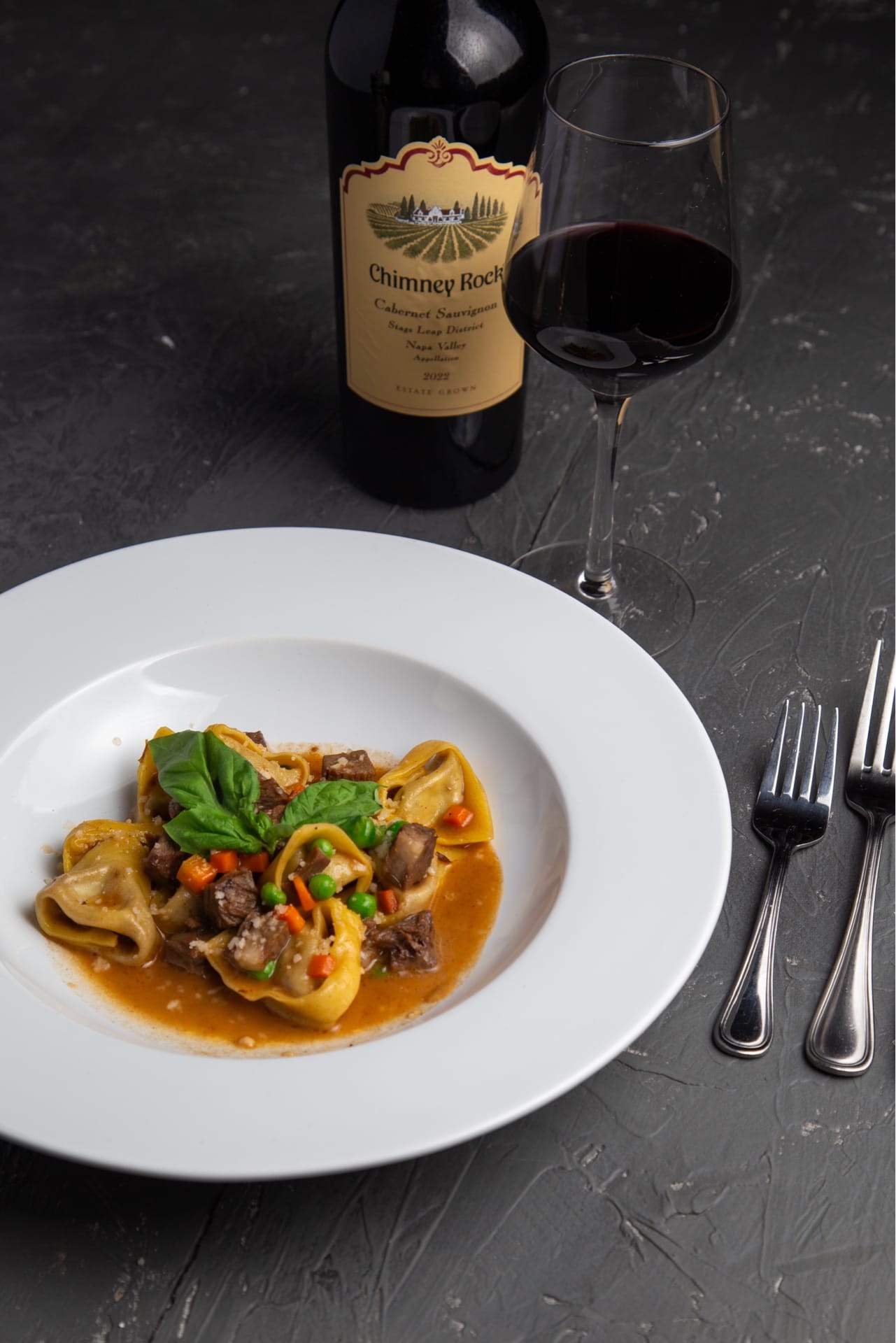 House-made pasta and wine set for a rehearsal dinner at Centro on the Square